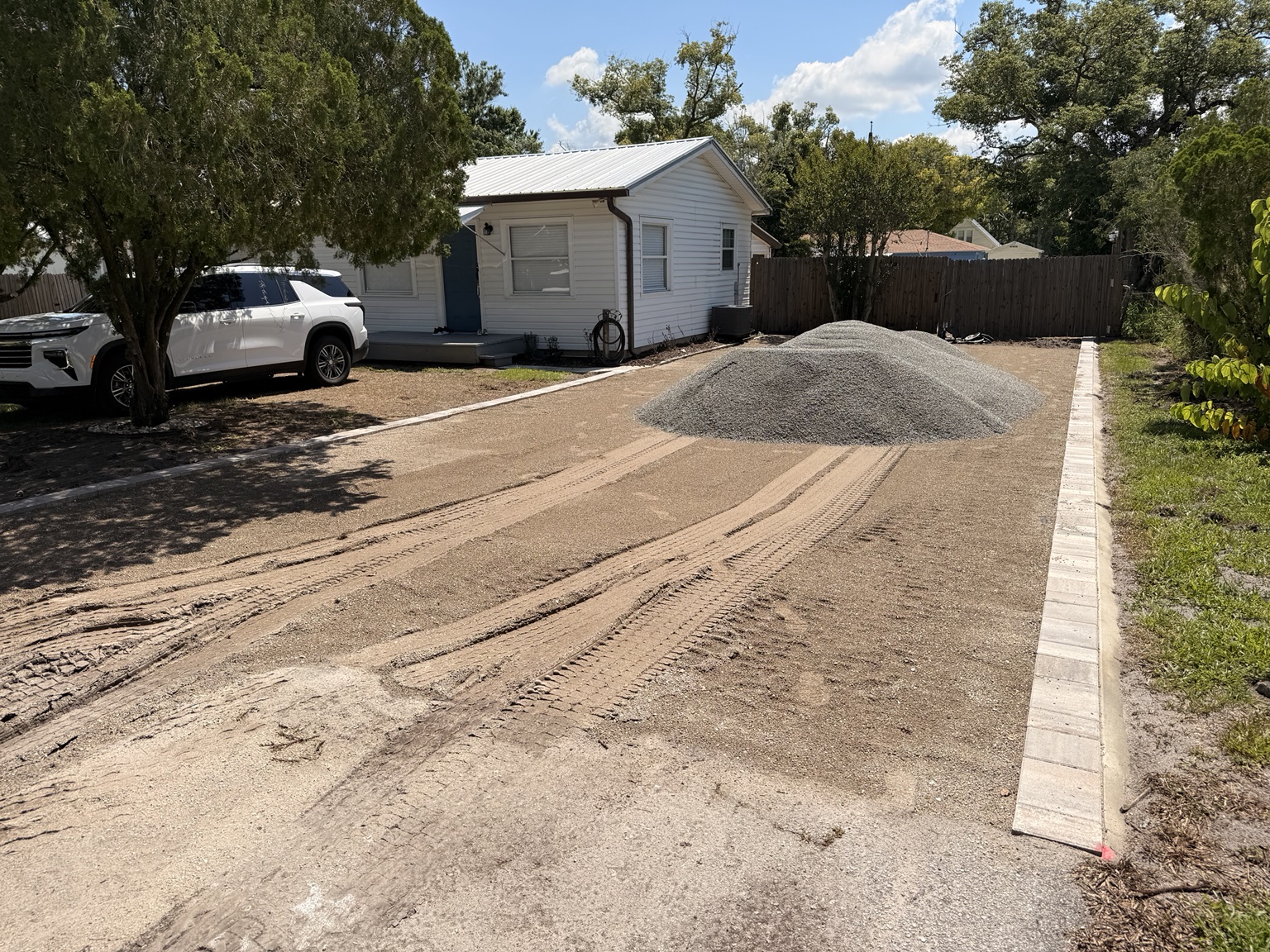 Before gravel driveway installation by C & S Grading in Central Florida