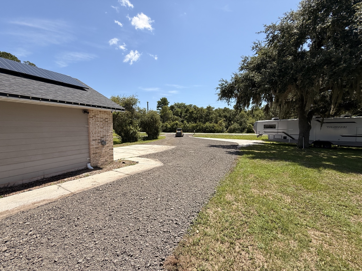 Completed asphalt millings driveway by C & S Grading in Central Florida