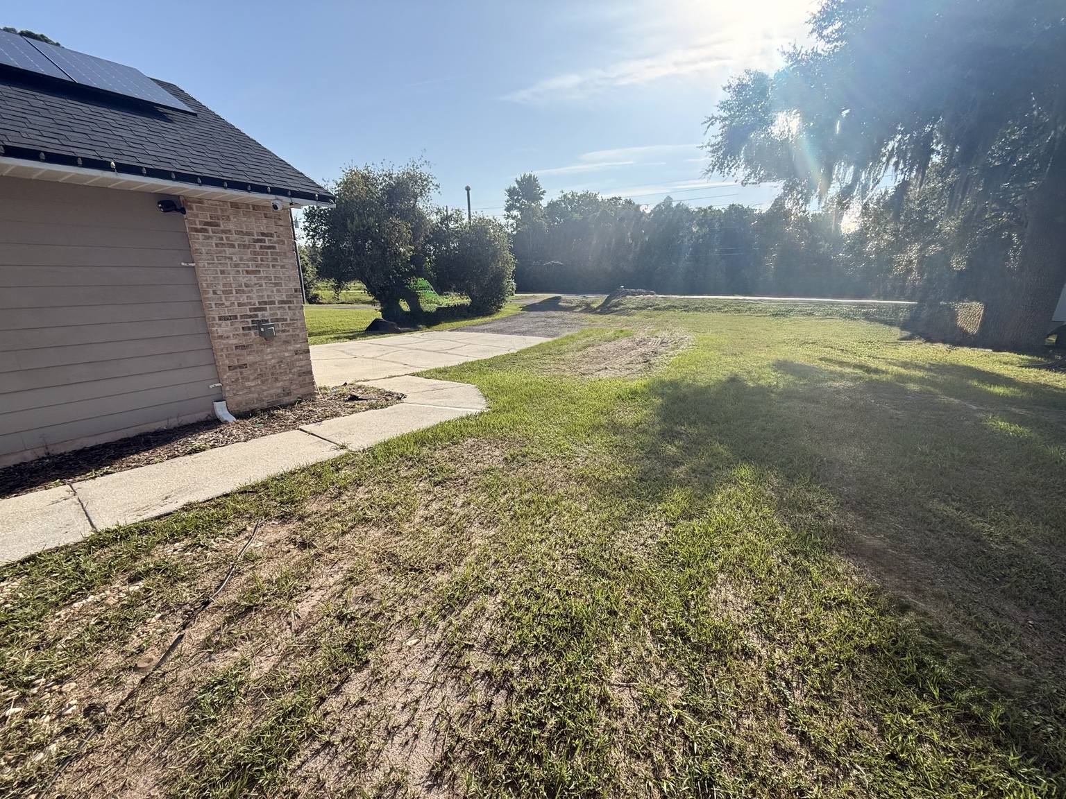 Before asphalt millings driveway installation by C & S Grading in Central Florida